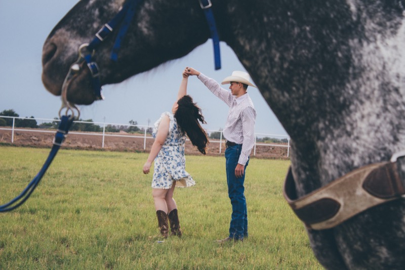 Couple with their horse at the ranch