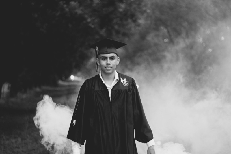 Graduate with smoke, black and white