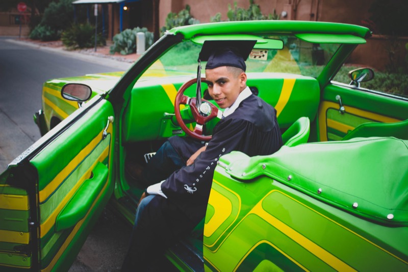 Senior portrait on a vintage tractor