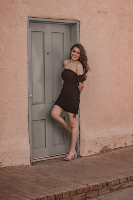 Quinceañera in a rose-colored outfit