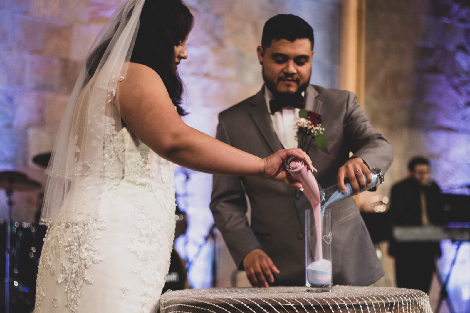 Bride and groom during their reception — still frame from K&M event coverage